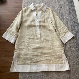 This beige and white Tuckernuck shift dress, size medium, is in great condition.